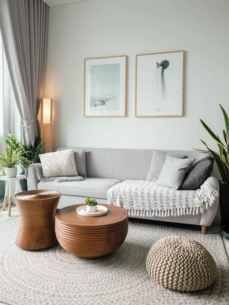 How to Decorate a Small Living Room: 8 Rules That Make Any Space Feel Bigger 1 decorate small living room - styled small living room with light tones and compact sofa